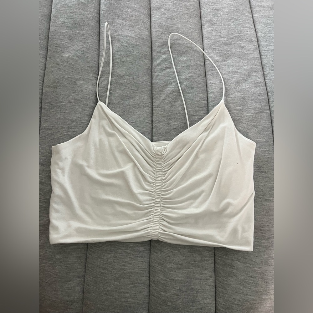 forever 21 white cropped tank, scrunched in the middle and very flattering,